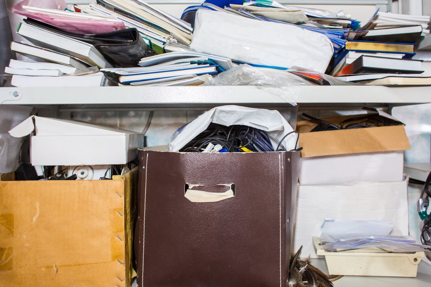 Cluttered document storage that will benefit from document indexing and scanning.
